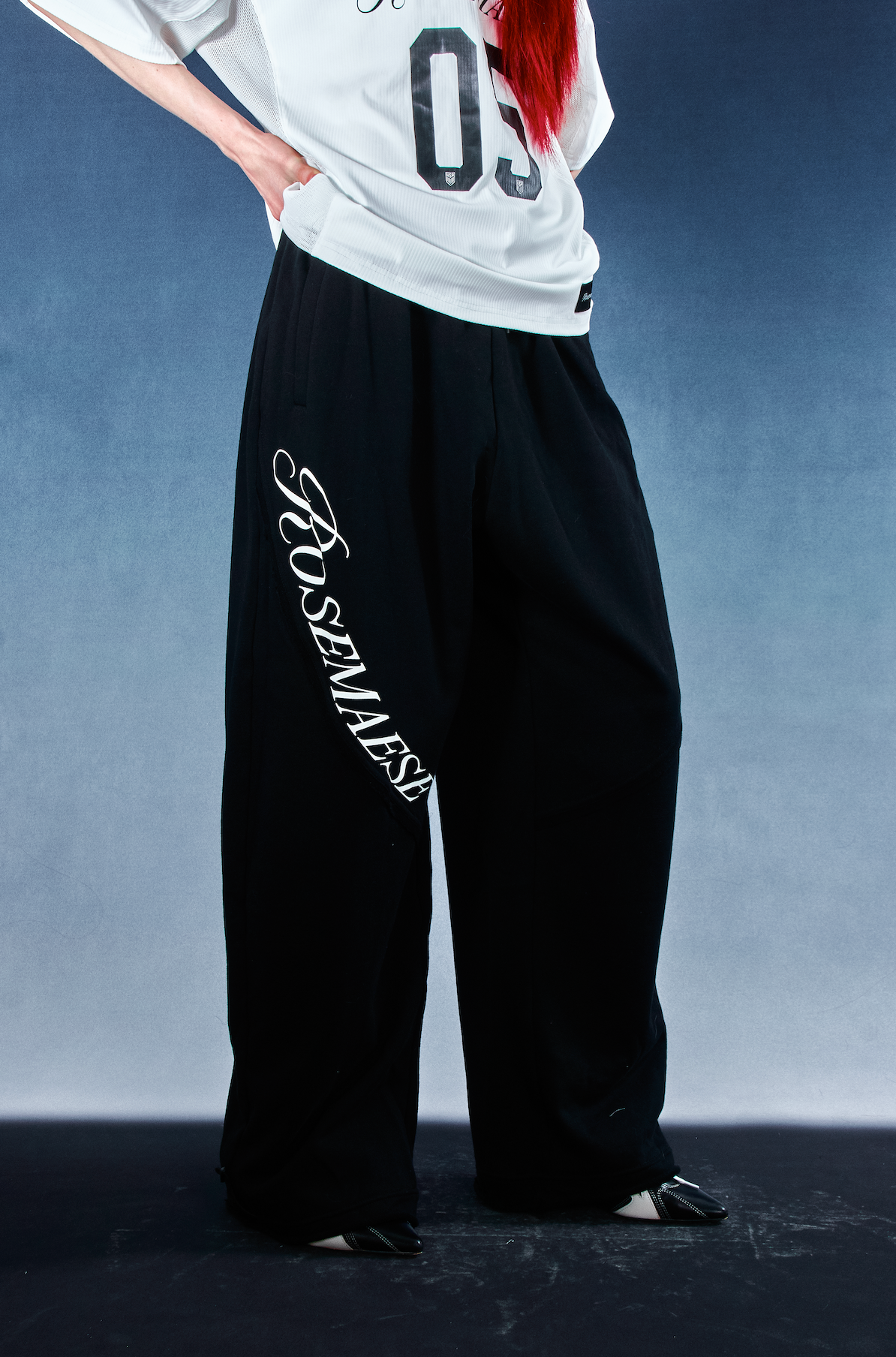 Stitch Panel Embroidered Wide‑Leg Sweatpants - Black
